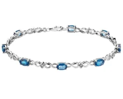 Apart Bransoletka z białego złota z diamentami i topazami London Blue - 18 cm - próba 585< Wszystkie