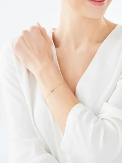 Apart Bransoletka z białego złota z diamentami - skrzydło - 0,01 ct - próba 375< Bransoletki Z Diamentami