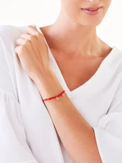 Apart Bransoletka z elementami żółtego złota i diamentami - podkowa, koniczyna, serce - 0,01 ct - próba 375< Wszystkie