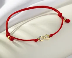 Apart Bransoletka z elementami żółtego złota i diamentem - nieskończoność - 0,004 ct - próba 375< Bransoletki Z Diamentami