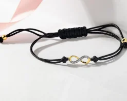 Apart Bransoletka z elementami żółtego złota i diamentem - nieskończoność - 0,004 ct - próba 375< Bransoletki Z Diamentami