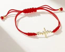 Apart Bransoletka z elementami żółtego złota i diamentem - EKG serca - 0,005 ct - próba 375< Wszystkie
