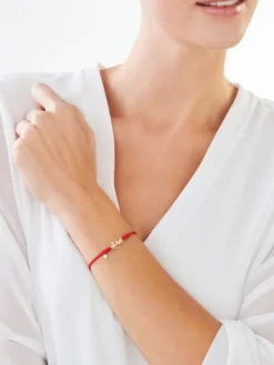 Apart Bransoletka z elementami żółtego złota i diamentem - koty, serce - 0,003 ct - próba 375< Wszystkie