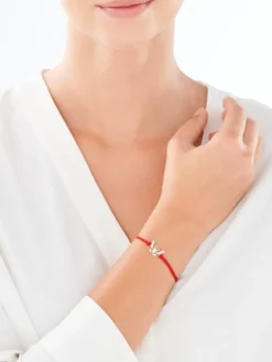 Apart Bransoletka z elementami żółtego złota i diamentami - motyl - 0,01 ct - próba 375< Wszystkie