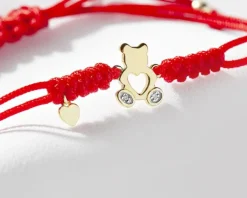 Apart Bransoletka z elementami żółtego złota i diamentami - miś, serce - 0,006 ct - próba 375< Bransoletki Z Diamentami