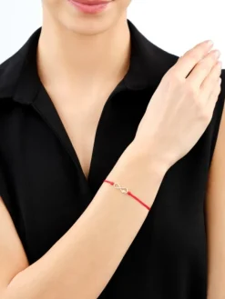 Apart Bransoletka z elementami żółtego złota i diamentami - nieskończoność, serce - 0,01 ct - próba 375< Wszystkie
