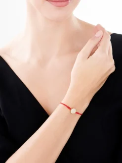 Apart Bransoletka z elementami żółtego złota, diamentem i masą perłową  - litera M - próba 375< Bransoletki Z Diamentami