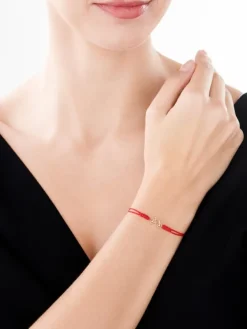 Apart Bransoletka z elementami żółtego złota i diamentami - rower - 0,006 ct - próba 375< Wszystkie