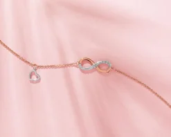 Apart Bransoletka z różowego i białego złota z diamentami - nieskończoność i serce - 0,01 ct - próba 375< Bransoletki Z Diamentami