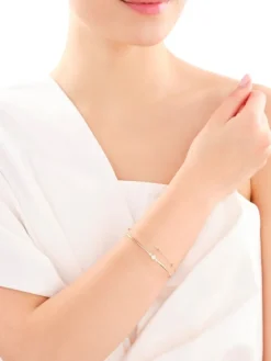 Hot Apart Bransoletka z żółtego i białego złota z brylantami - 0,03 ct - próba 375