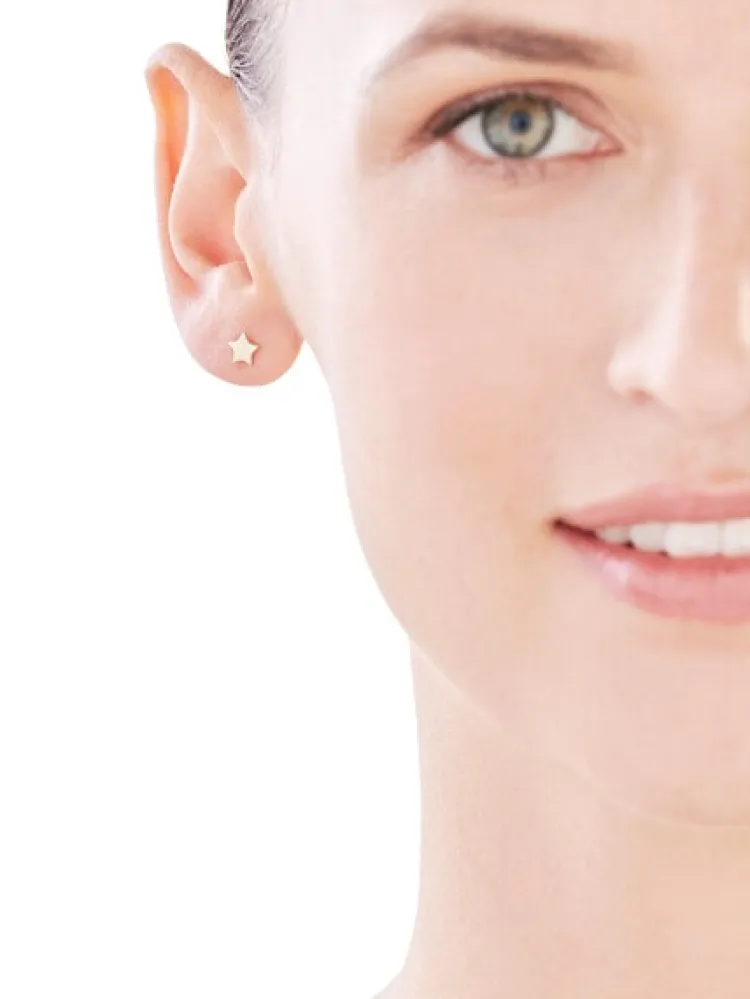 Clearance Apart Kolczyki z żółtego złota z diamentami - gwiazdy - 0,004 ct - próba 585