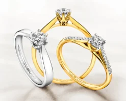 Apart Pierścionek z żółtego złota z brylantem - 0,18 ct - próba 750< Pierścionki