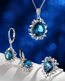 Apart Zawieszka z białego złota z diamentami i topazem London Blue - próba 585< Zawieszki