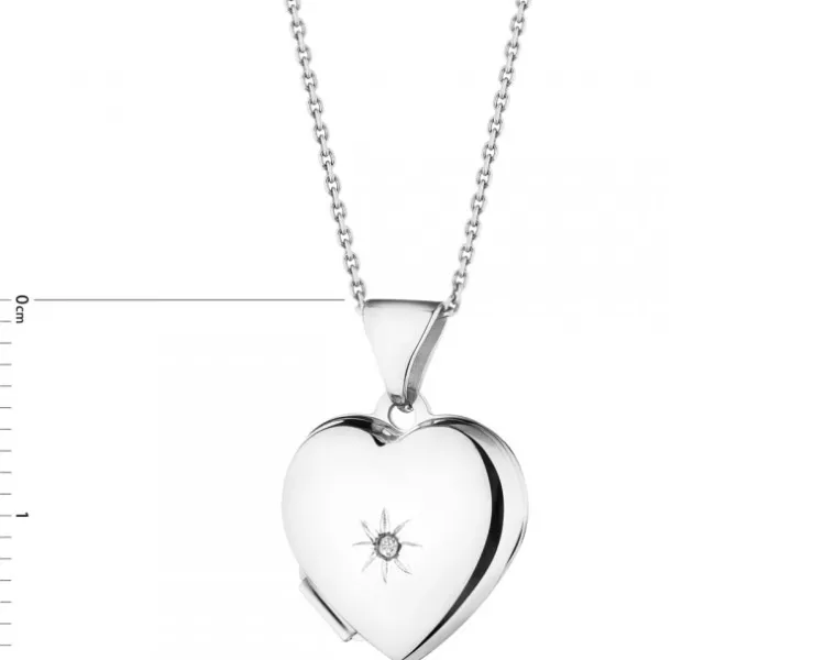 Outlet Apart Zawieszka z białego złota z diamentem - puzderko - serce - 0,005 ct - próba 375