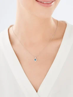 Outlet Apart Zawieszka z białego złota z diamentem i topazem - serce - próba 585