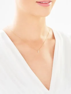 Apart Zawieszka z żółtego i białego złota z brylantem - 0,02 ct - próba 585< Zawieszki