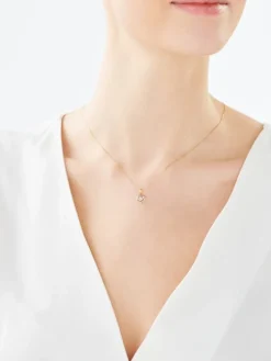 Apart Zawieszka z żółtego i białego złota z brylantem - serce - 0,01 ct - próba 375< Zawieszki