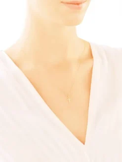 Apart Zawieszka z żółtego złota z brylantem - krzyż - 0,006 ct - próba 585< Zawieszki