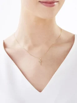 Apart Zawieszka z żółtego złota z brylantem - krzyż - 0,008 ct - próba 375< Zawieszki