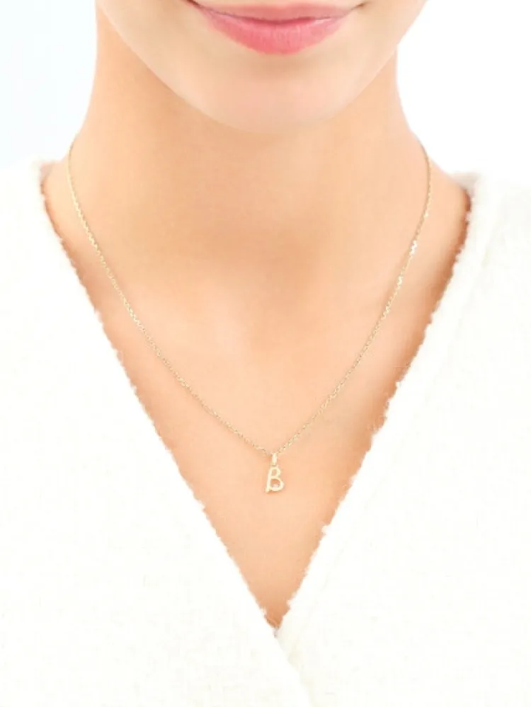 Apart Zawieszka z żółtego złota z diamentem - litera B - 0,003 ct - próba 375< Wszystkie