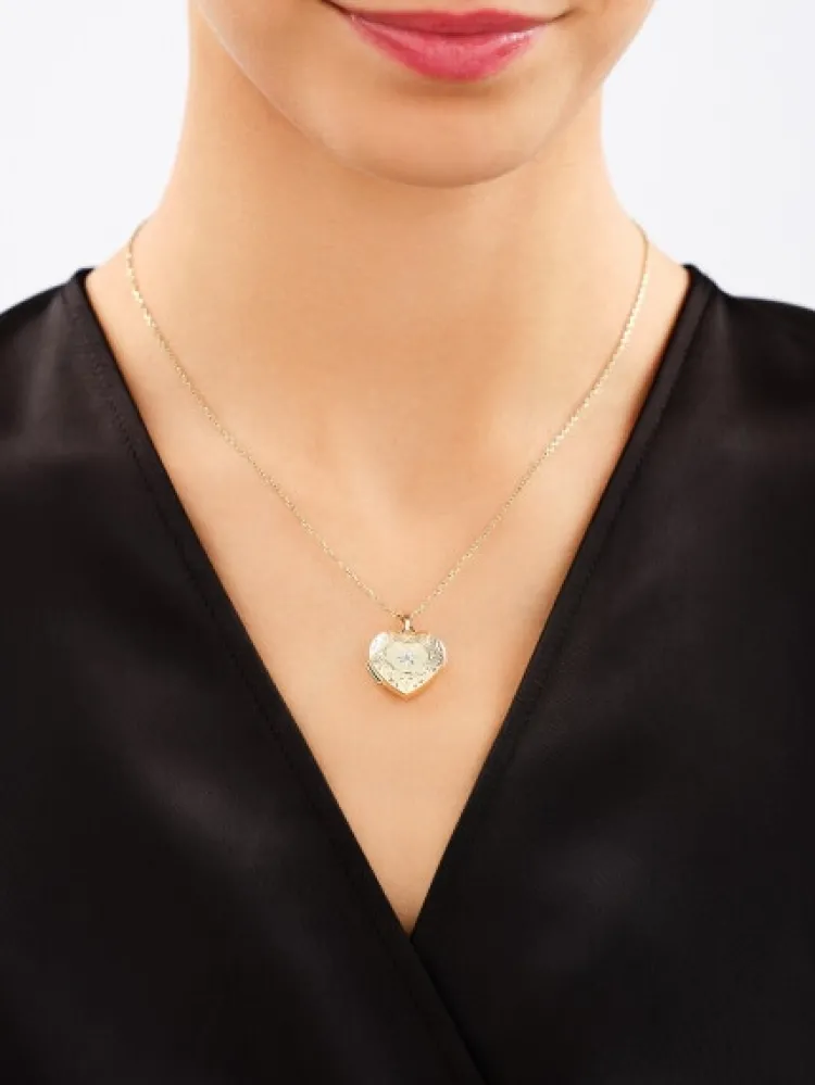 Online Apart Zawieszka z żółtego złota z diamentem - puzderko - serce - 0,005 ct - próba 585