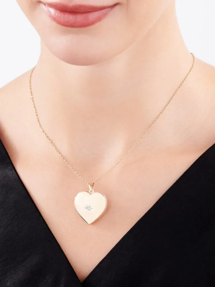 Sale Apart Zawieszka z żółtego złota z diamentem - puzderko - serce - 0,005 ct - próba 585