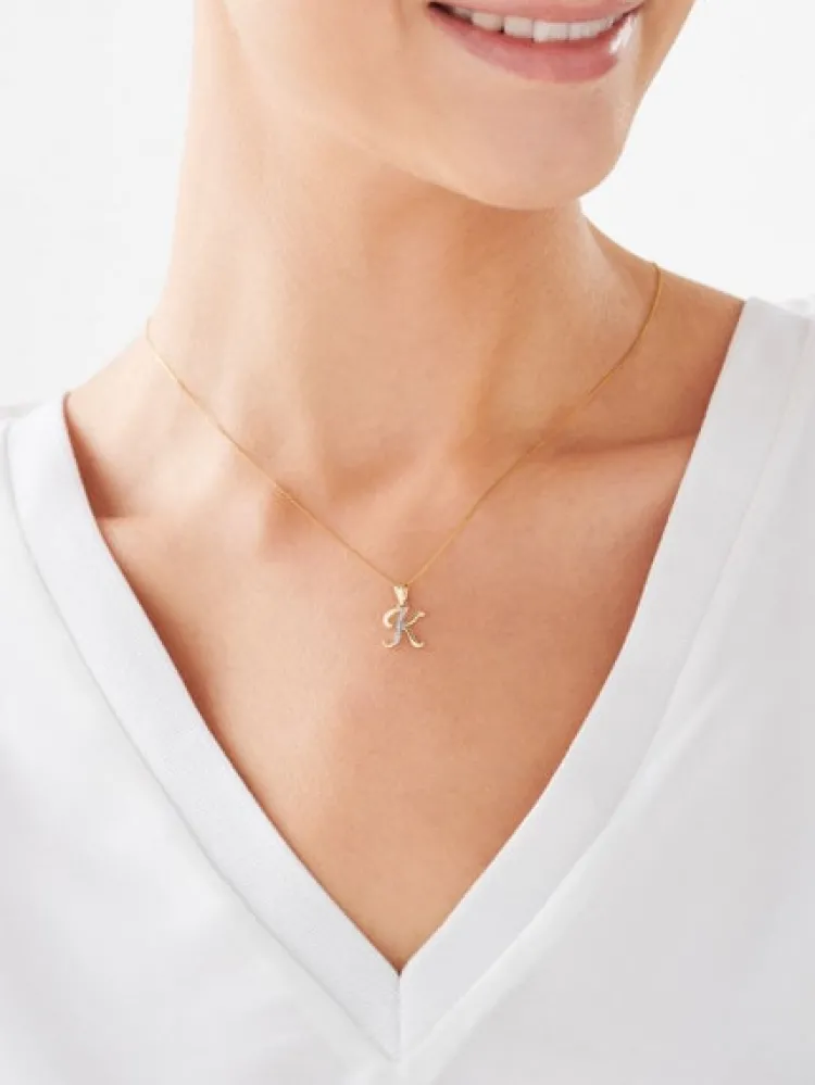 Apart Zawieszka z żółtego złota z diamentem - litera K - 0,003 ct - próba 375< Zawieszki