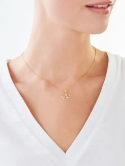 Apart Zawieszka z żółtego złota z diamentem - litera A, serce - 0,005 ct - próba 375