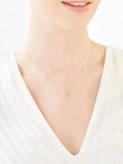 Apart Zawieszka z żółtego złota z diamentami - medalik Matka Boska - 0,006 ct - próba 375< Zawieszki