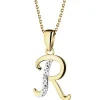 Apart Zawieszka z żółtego złota z diamentem - litera R - 0,003 ct - próba 375< Zawieszki