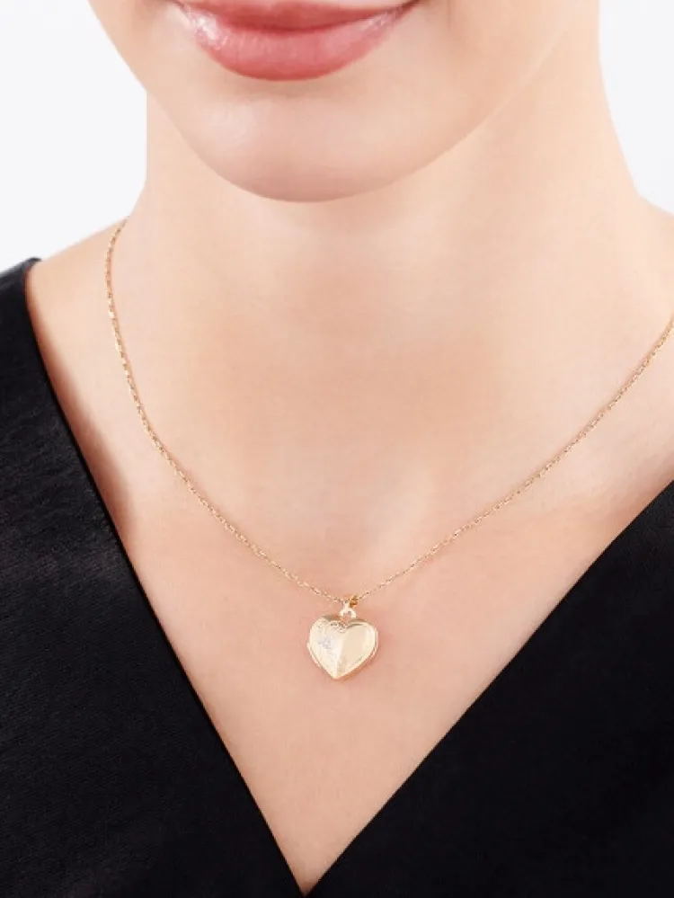Apart Zawieszka z żółtego złota z diamentem - puzderko - serce - 0,01 ct - próba 585< Wszystkie