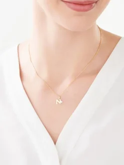 Apart Zawieszka z żółtego złota z diamentem - litera N - 0,004 ct - próba 375< Zawieszki