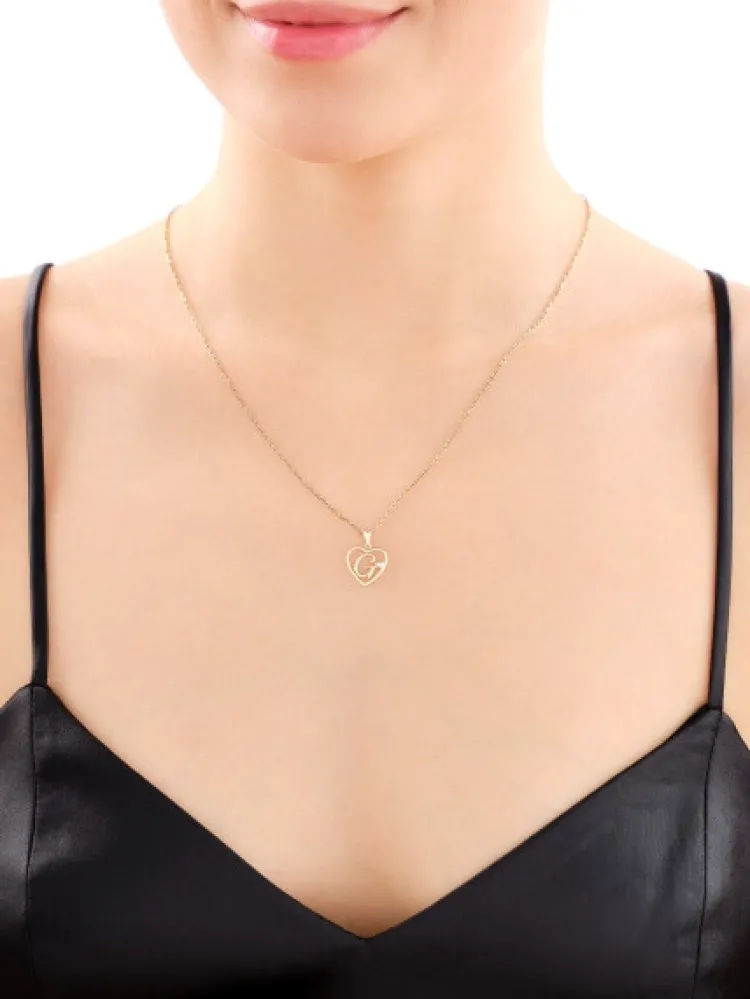 Apart Zawieszka z żółtego złota z diamentem - litera G, serce - 0,005 ct - próba 375< Wszystkie