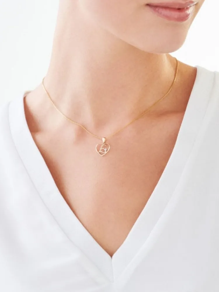 Apart Zawieszka z żółtego złota z diamentem - litera E, serce - 0,005 ct - próba 375