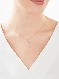 Online Apart Zawieszka z żółtego złota z diamentem i topazem - serce - próba 375