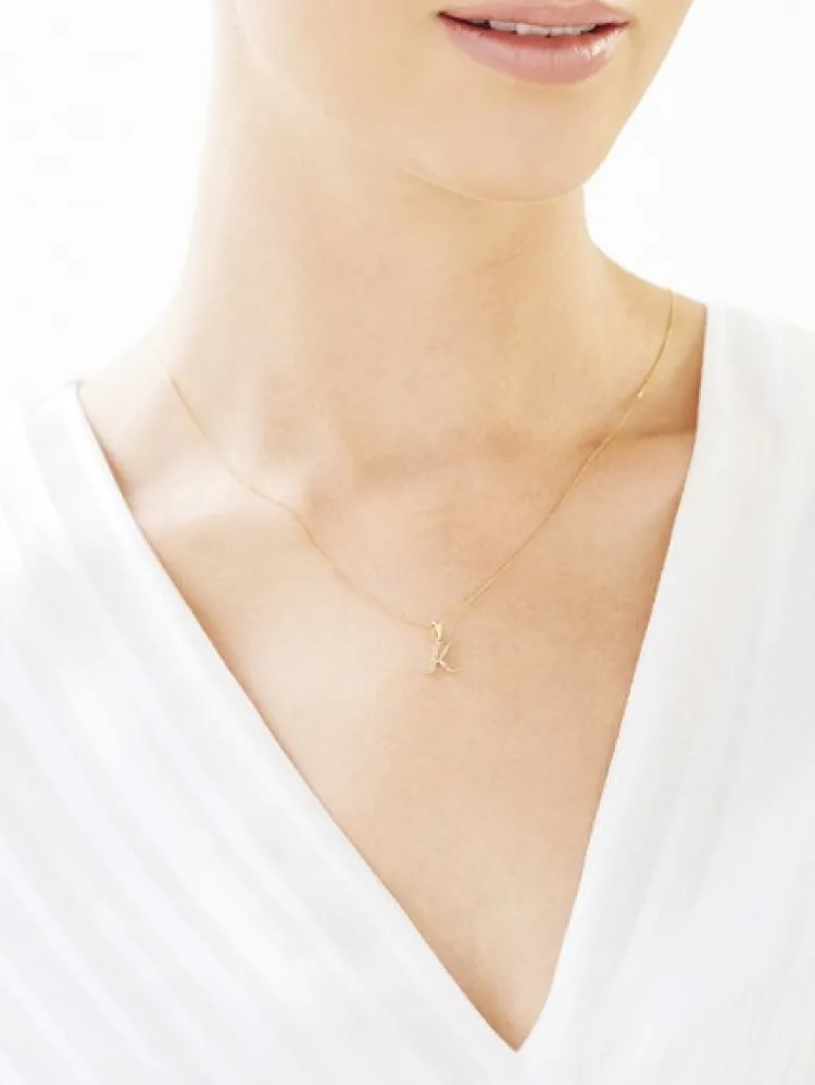 Discount Apart Zawieszka z żółtego złota z diamentem - litera K - 0,004 ct - próba 585
