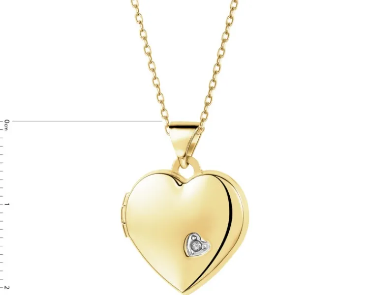 Outlet Apart Zawieszka z żółtego złota z diamentem - puzderko - serce - 0,005 ct - próba 375