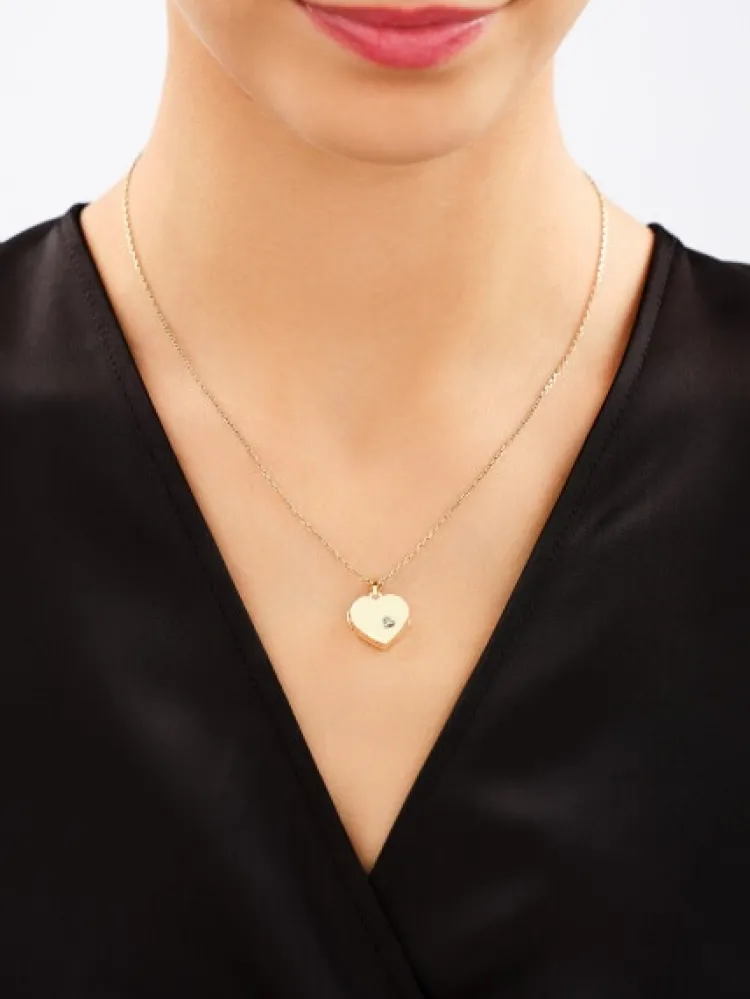Outlet Apart Zawieszka z żółtego złota z diamentem - puzderko - serce - 0,005 ct - próba 375