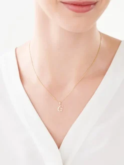 Outlet Apart Zawieszka z żółtego złota z diamentem - litera G - 0,003 ct - próba 375