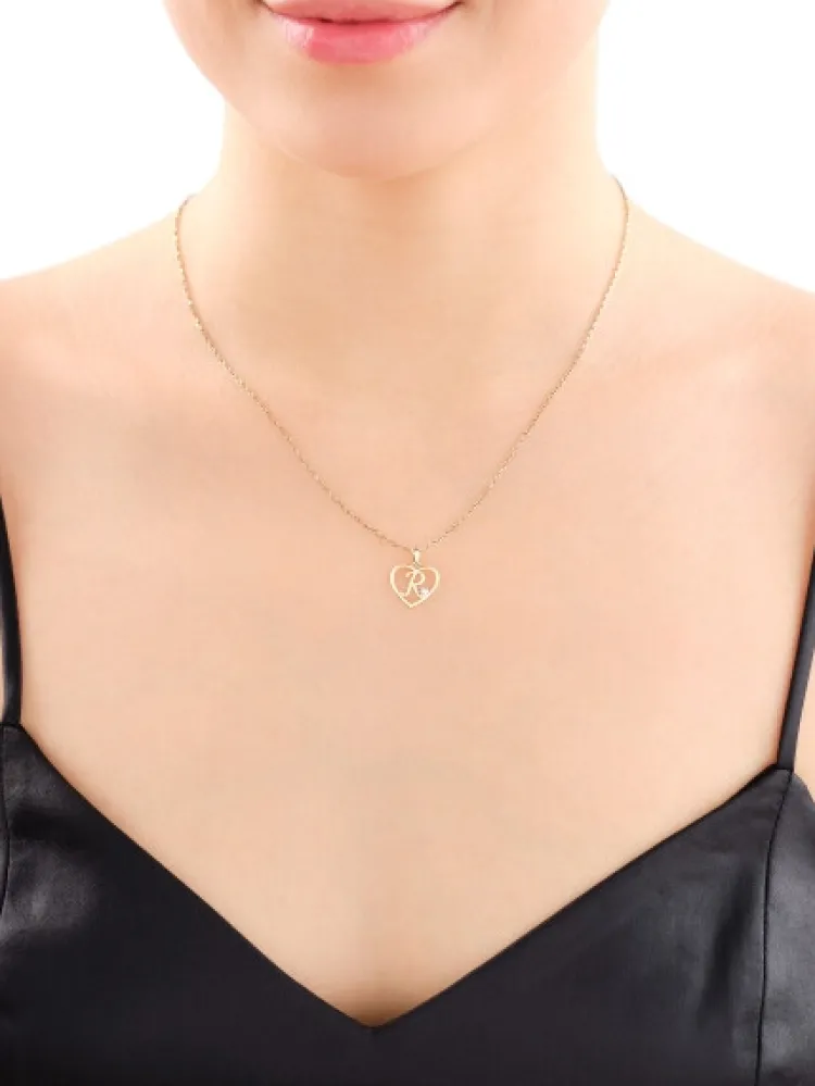Apart Zawieszka z żółtego złota z diamentem - litera R, serce - 0,005 ct - próba 375< Zawieszki