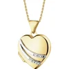Apart Zawieszka z żółtego złota z diamentami - puzderko - serce - 0,01 ct - próba 375