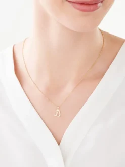 Apart Zawieszka z żółtego złota z diamentem - litera B - 0,003 ct - próba 375< Zawieszki