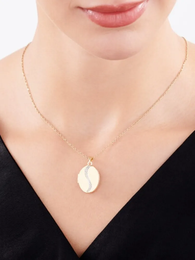 Apart Zawieszka z żółtego złota z diamentem - puzderko - 0,005 ct - próba 375< Zawieszki