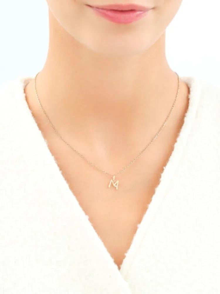 Apart Zawieszka z żółtego złota z diamentem - litera M - 0,003 ct - próba 375< Wszystkie