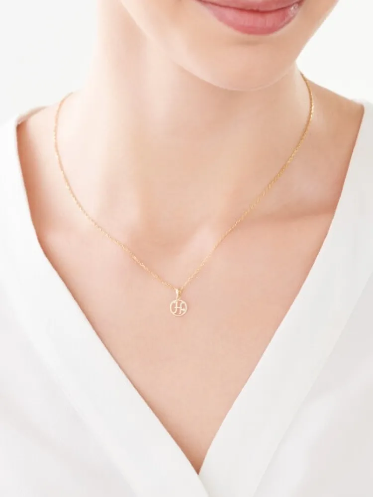 Discount Apart Zawieszka z żółtego złota z diamentem - litera H - 0,003 ct - próba 585
