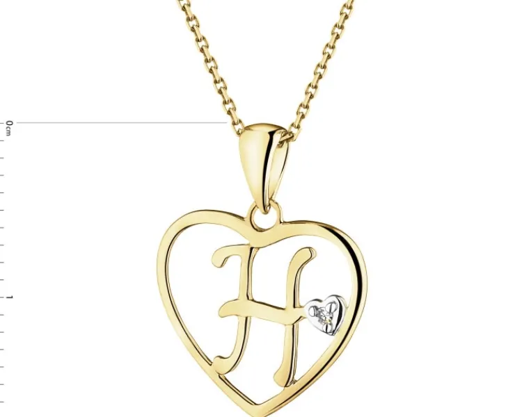 Apart Zawieszka z żółtego złota z diamentem - litera H, serce - 0,005 ct - próba 375< Zawieszki