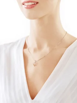Apart Zawieszka z żółtego złota z diamentami - serca - 0,01 ct - próba 375< Zawieszki