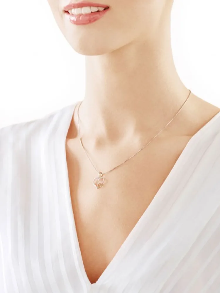 Apart Zawieszka z żółtego złota z diamentami - serca - 0,01 ct - próba 375< Zawieszki