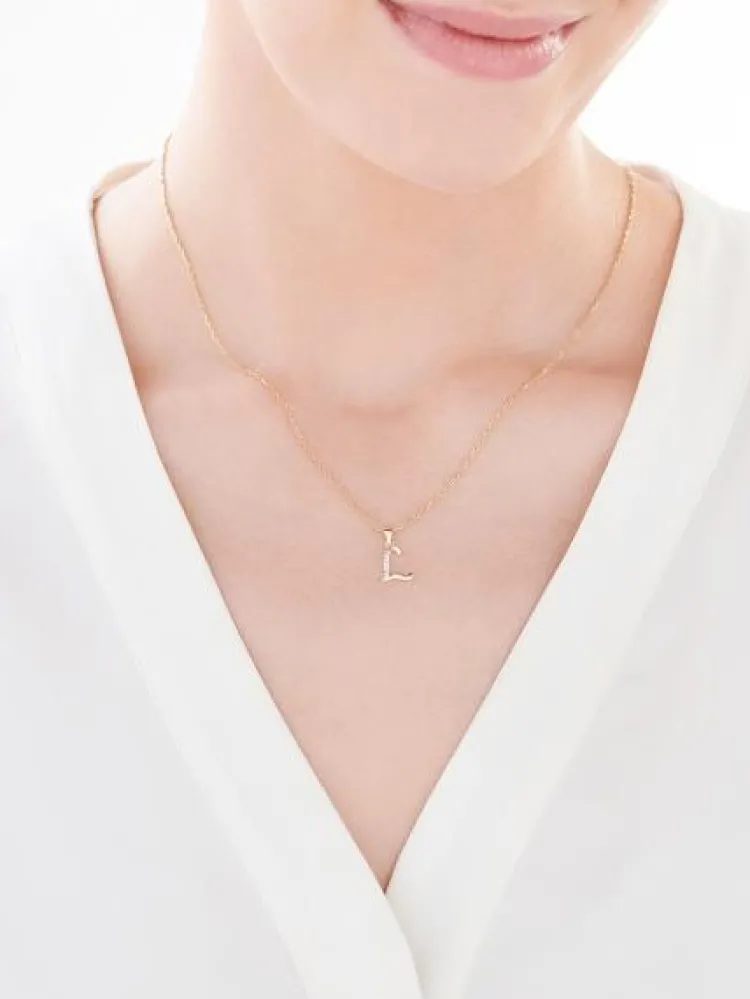 Apart Zawieszka z żółtego złota z diamentem - litera L - 0,003 ct - próba 375< Zawieszki