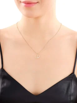 Online Apart Zawieszka z żółtego złota z diamentem - litera S, serce - 0,005 ct - próba 375